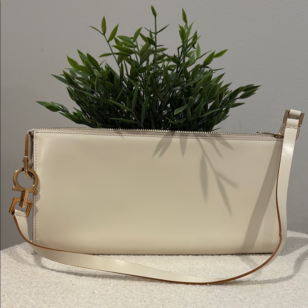 Salvatore Ferragamo Cream Clutch with Gold Hardware